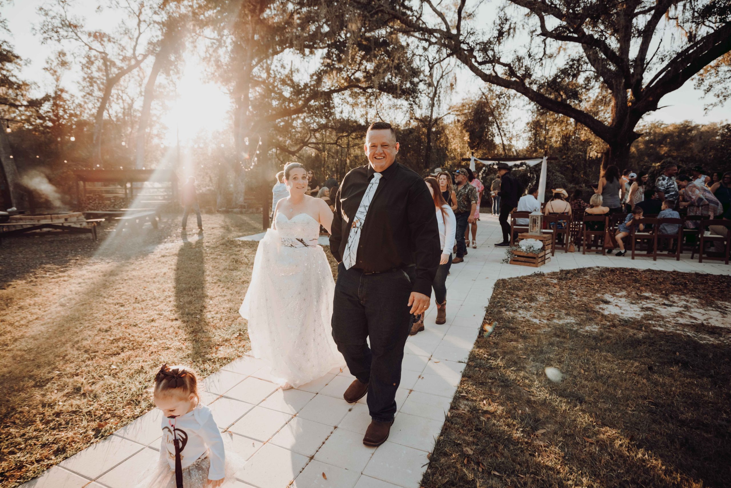 bride and groom walking down the isle barn wedding photography