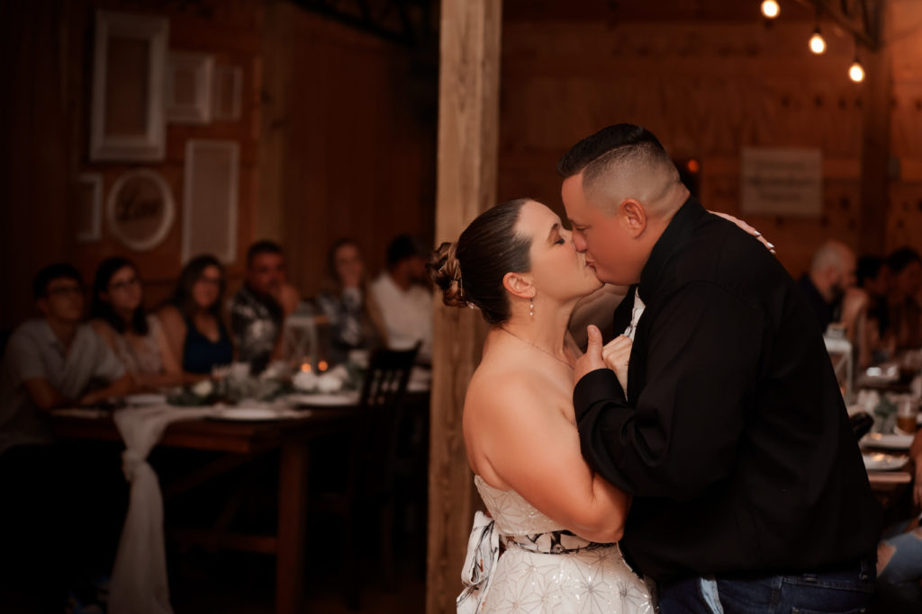 bride and groom kissing