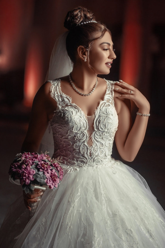 luxurious bride holding her bouquet